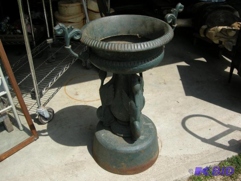 lot 559 image: Old cast iron swan planter