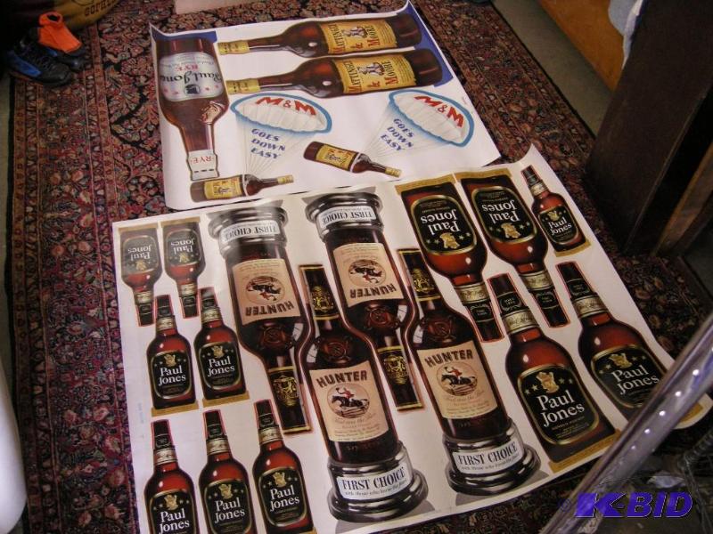 lot 645 image: 2 different vintage (Hunter, Mattingly & Moore) Paul Jones whiskey uncut advertiser sheets