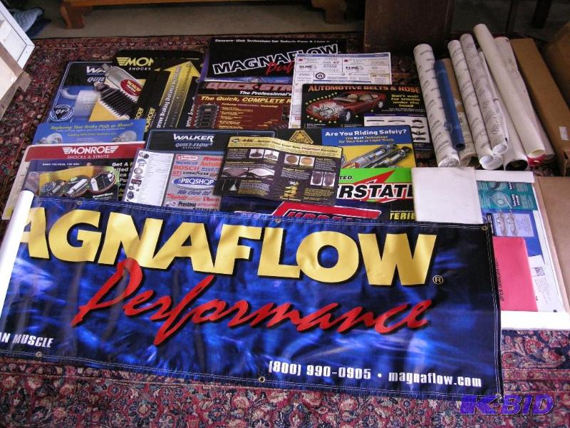 lot 653 image: Group of automotive signs, mats, vinyl banners, etc