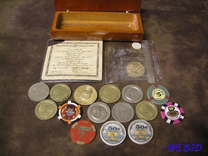 lot 660 image: Gaming tokens, John Wayne Commemorative coin