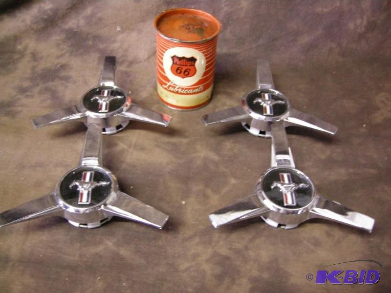lot 669 image: Vintage Phillips 66 Lubricants can, 4 Mustang hub caps