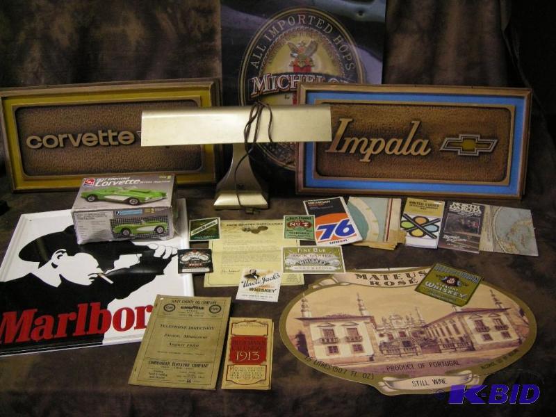 lot 674 image: Group including signs, vintage road maps, old whiskey labels, light
