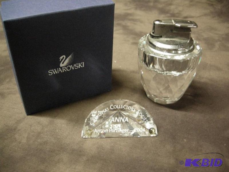 lot 72 image: Swarovski Anna 2004 plaque and lighter