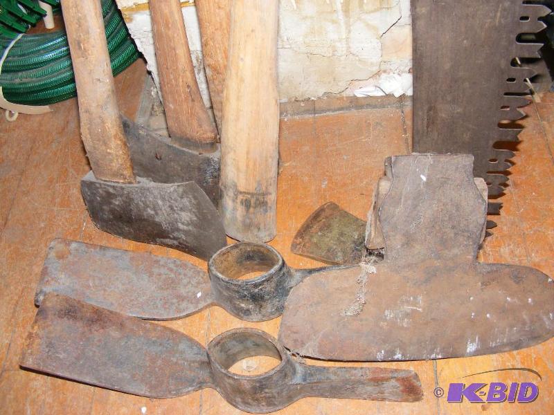 lot 128 image: Axes, saw, rock pic heads and handles level a...
