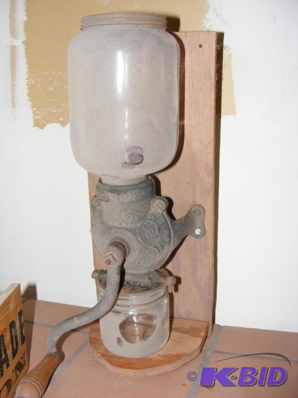 lot 13 image: Old Arcade Coffee Grinder, mounted on board...