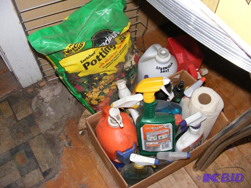 lot 131 image: bag of potting soil, chemicals and cleaning s...
