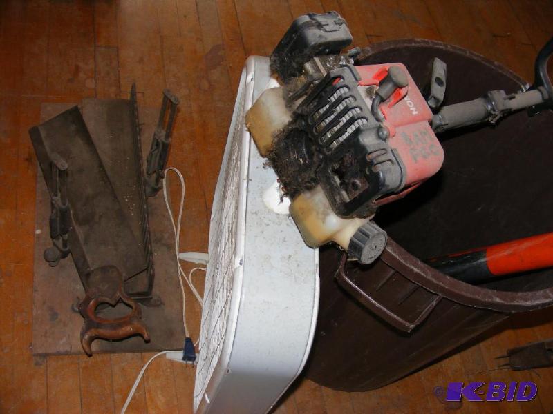 lot 141 image: weed wacker, untested. Garbage can, box fan a...