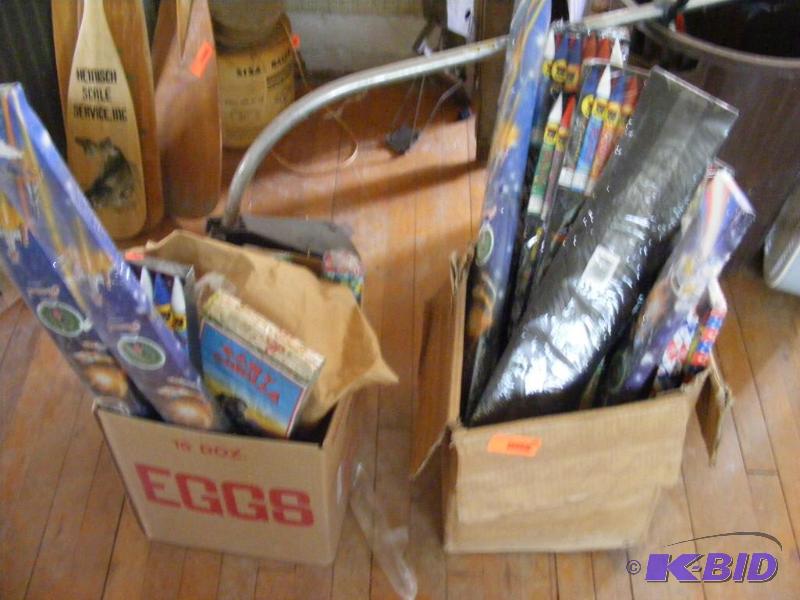 lot 182 image: two boxes of fireworks. You must be 18 to buy...