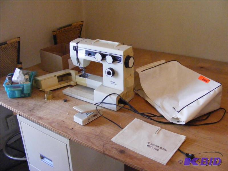 lot 248 image: Riccar Sewing Machine, with Manual. Model 350...