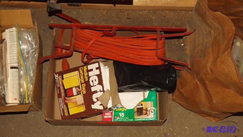 lot 377 image: extension cord, trash bags, camping items...
