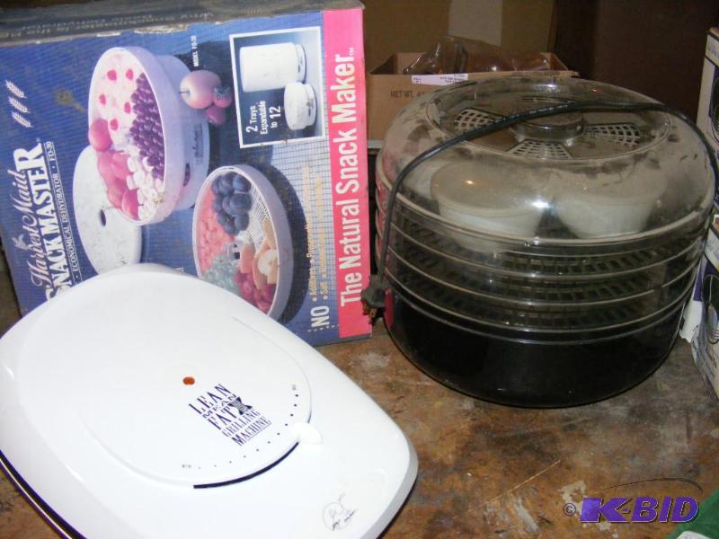 lot 42 image: Two food dehydrators and a Lean mean Grilling...