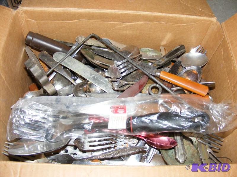 lot 49 image: Silverware and other kitchen utensils...