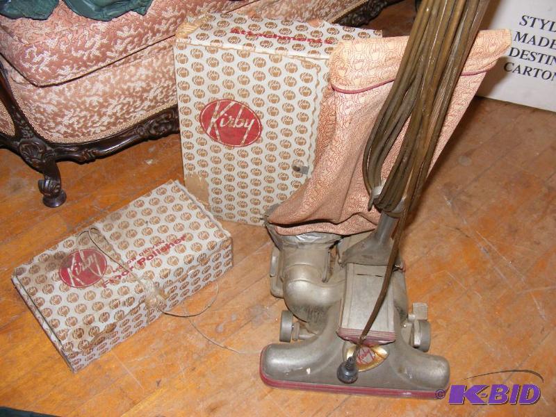 lot 70 image: Old Kirby Vacuum Cleaner with some attachment...