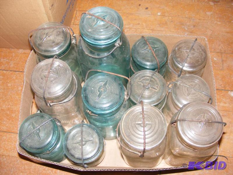lot 79 image: canning jars with lids...