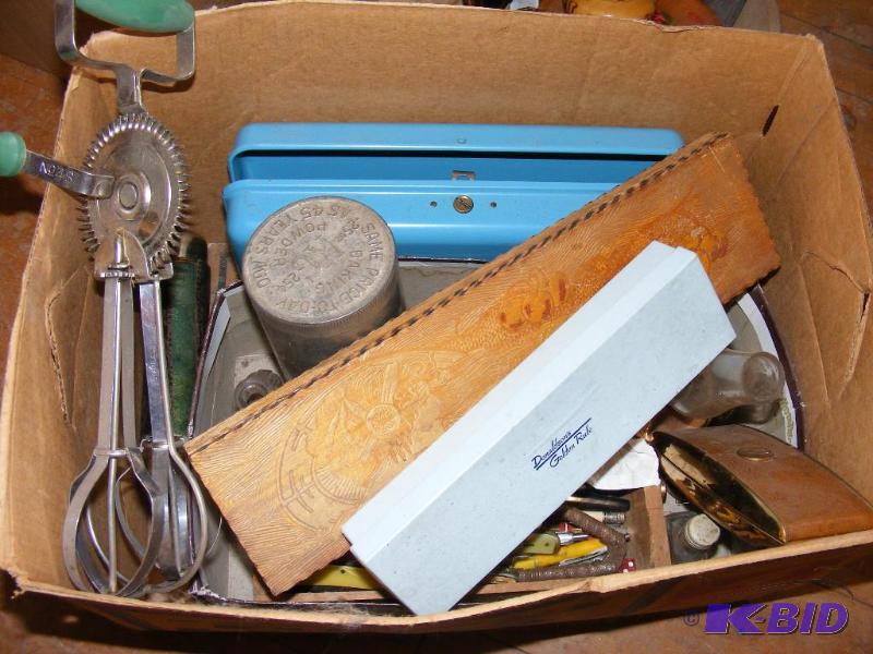 lot 80 image: Variety lot of household items, some advertis...