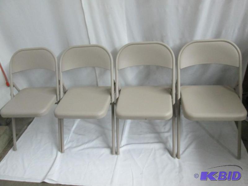 Four Samsonite Folding Chairs