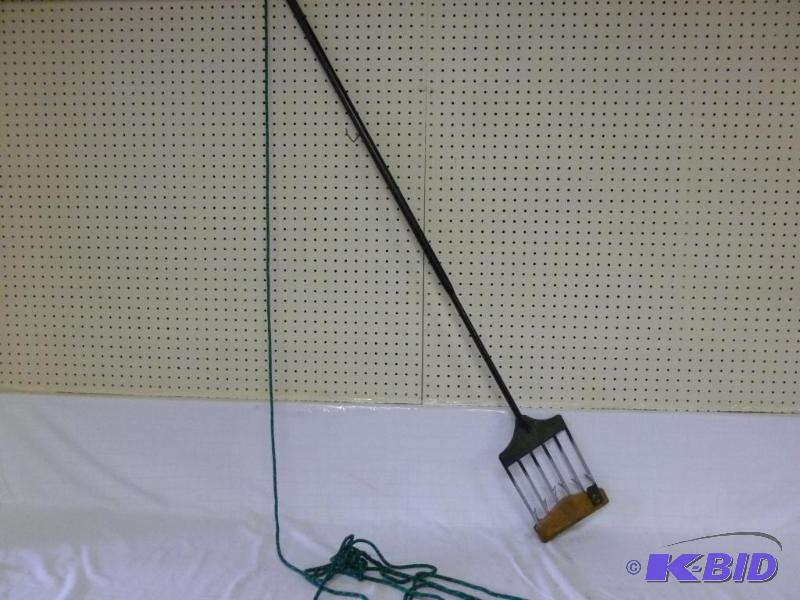 lot 12 image: Heavy duty six tine dark house fishing spear,...