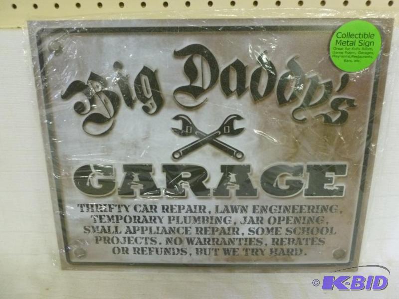lot 131 image: Big Daddys Garage metal sign that measures 1...