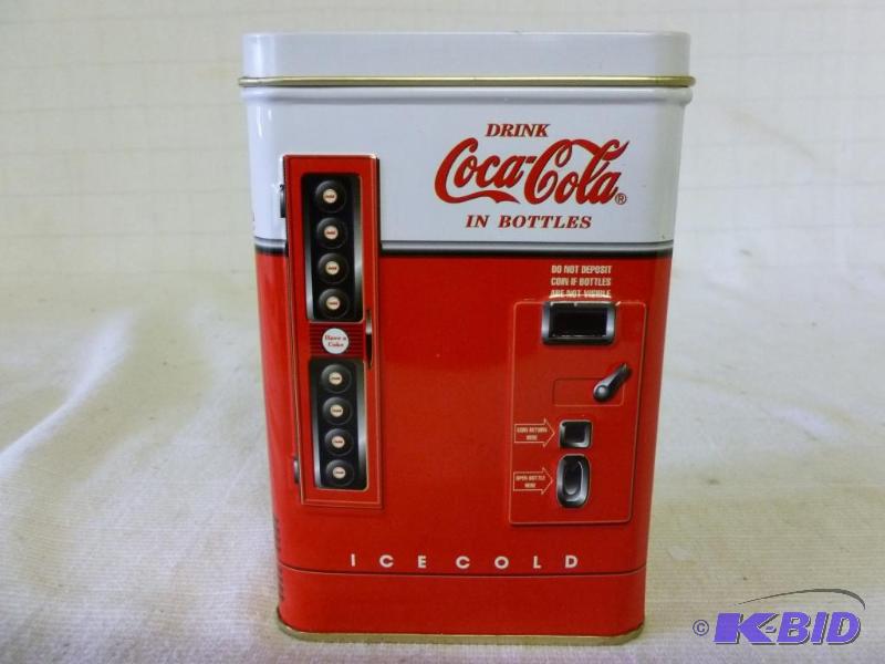 lot 141 image: Collectible Coca-Cola metal pop machine conta...