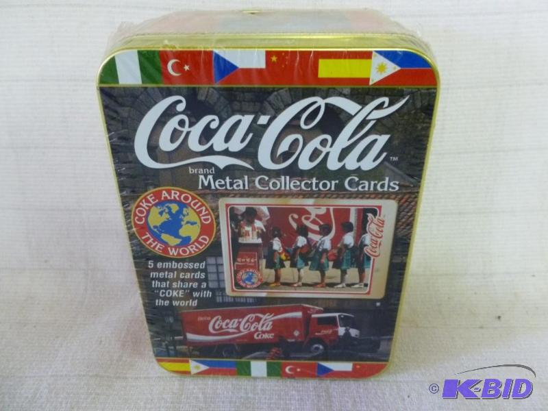 lot 143 image: Collectible Coca-Cola set of five metal colle...