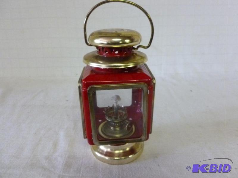 lot 152 image: Brass plated metal hanging oil lantern that m...
