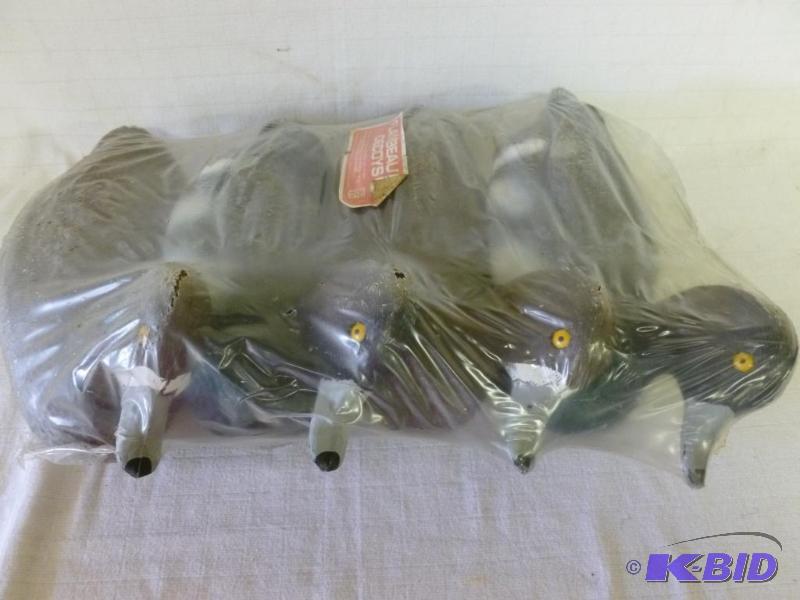 lot 43 image: Lot of four Flambeau bluebill duck decoys, br...