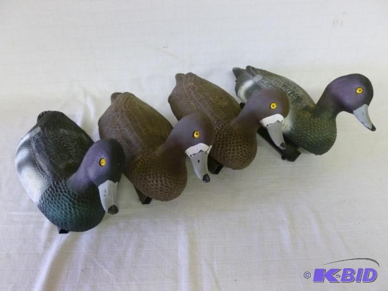 lot 44 image: Lot of four Flambeau bluebill duck decoys, lo...