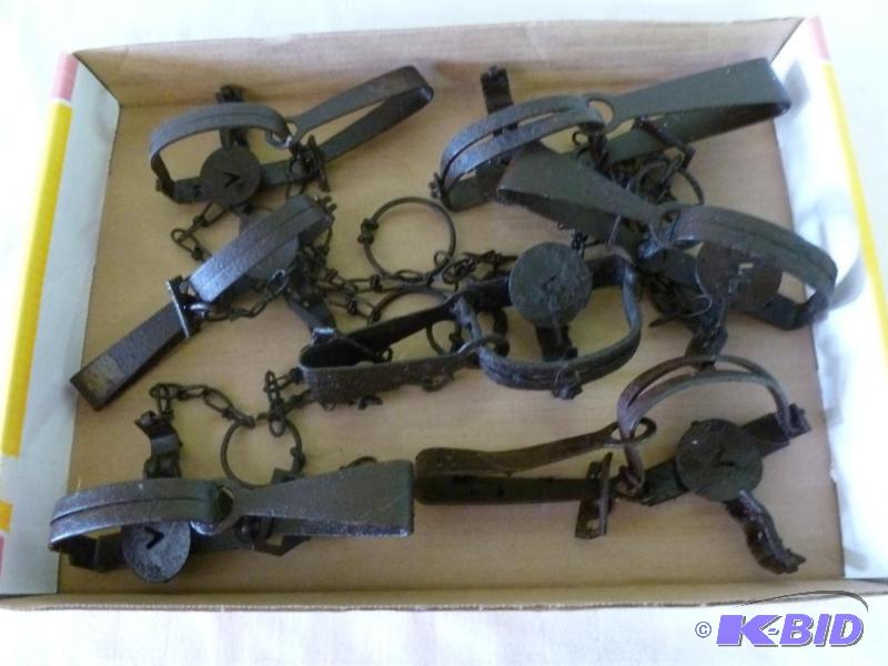 lot 55 image: Lot of seven Victor leg traps....
