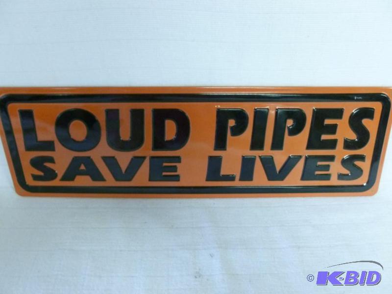 lot 67 image: Loud Pipes Save Lives embossed metal sign tha...