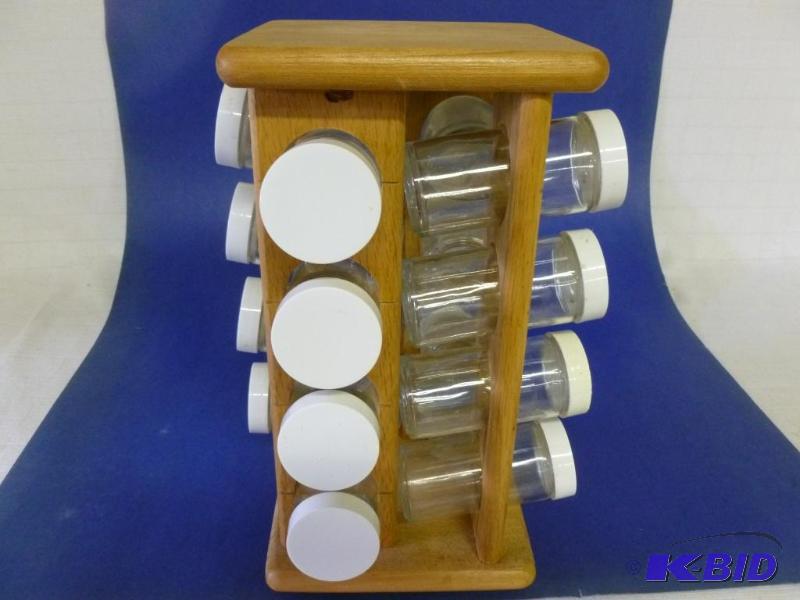 lot 70 image: Wooden turn table spice rack with sixteen gla...