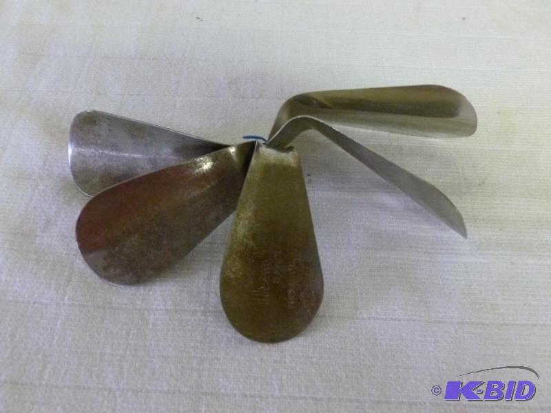 lot 81 image: Lot of five vintage metal shoe horns, Red Win...