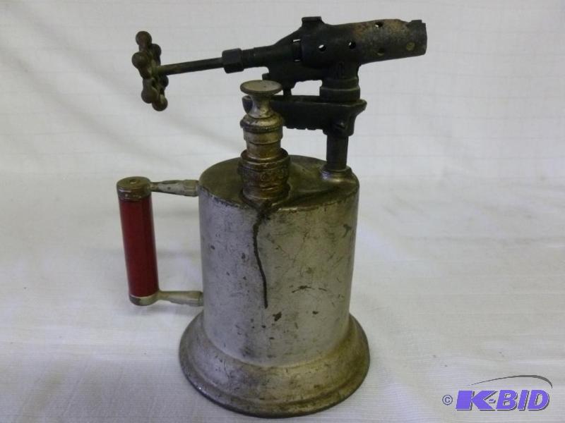 lot 83 image: Vintage red wood handled blow torch, measures...