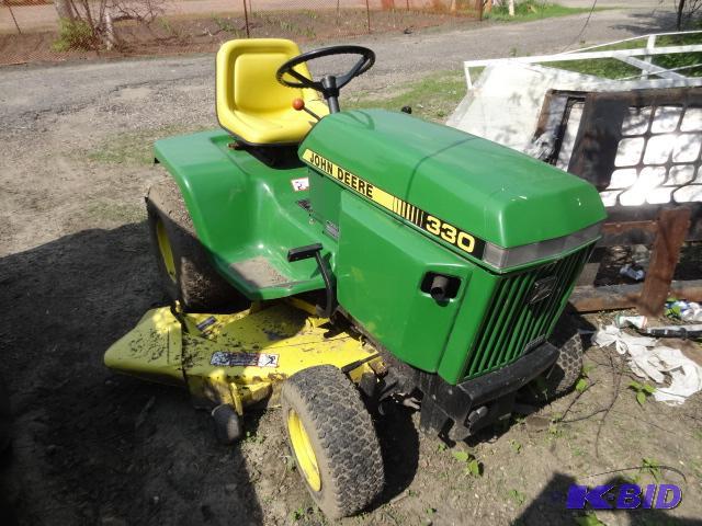 lot 3 image: John Deere 330 48" lawn tractor. 681 hou...