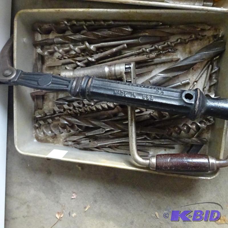 lot 58 image: Tray full of drill bits. Slide nail puller...