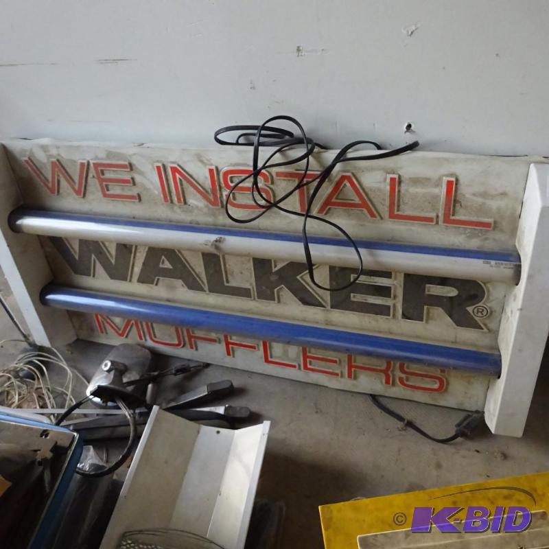 lot 61 image: Walker Muffler lighted sign....
