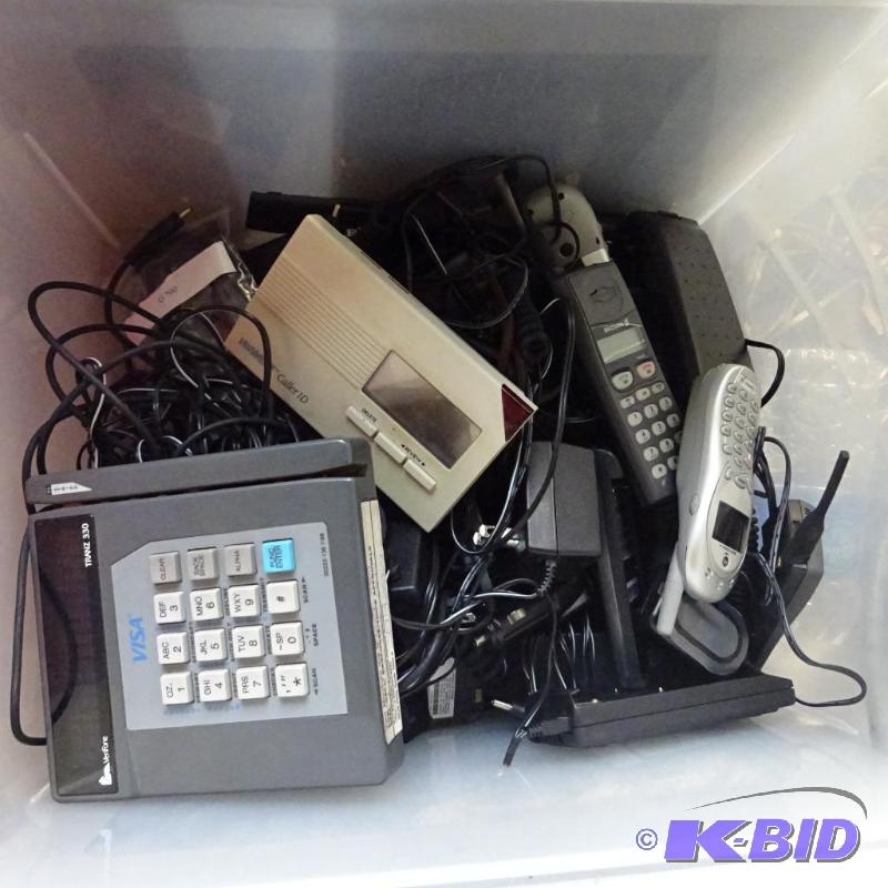 lot 63 image: Cell phones. Power supplies. Credit card swip...