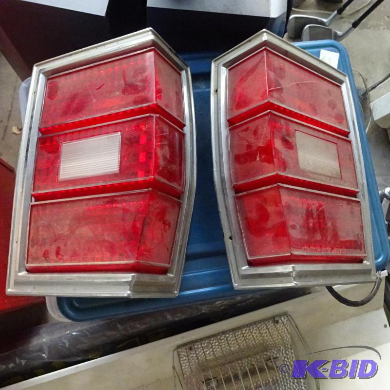 lot 64 image: Vintage Buick left and Right tail light assem...