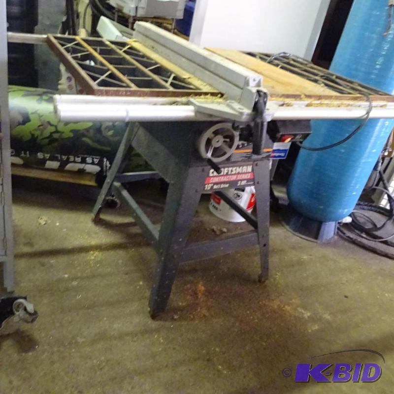 lot 74 image: Craftsman 10" belt drive table saw. Come...