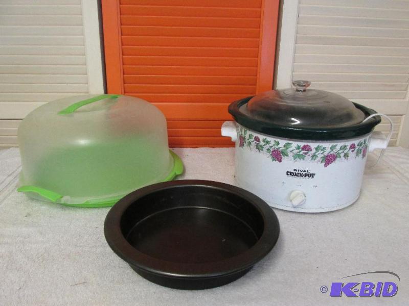 A cake carrier, Crock Pot (heats up) and a ex...