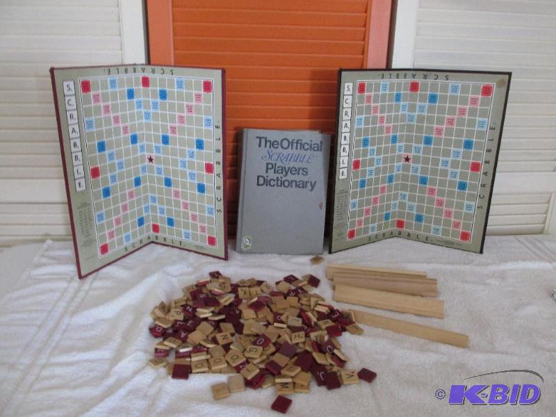 Two Boards a bunch of tiles and the Offical Scrabble Players Dictionary (maybe a little dated)