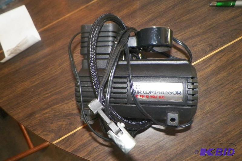 lot 20 image: Car Battery Operated Compressor