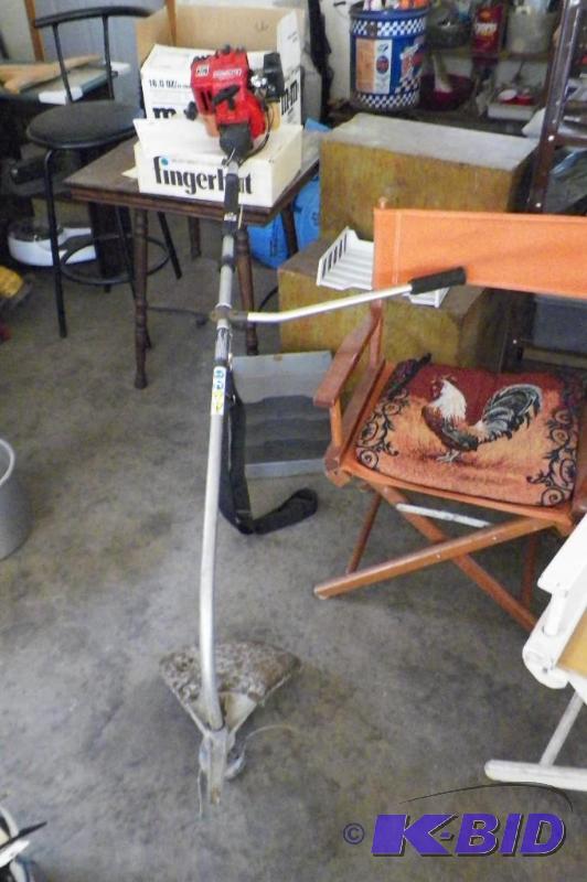 lot 91 image: Homelite ST185 Gas Powered Weed Trimmer Works