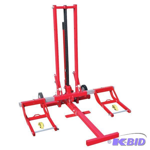 lot 42 image: Larin Multi Use Lawn Mower Lift and Farm Jack...
