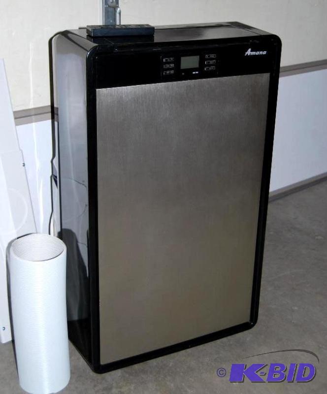 lot 55 image: Amana 14,000 BTU Portable Air Conditioner, 3 ...