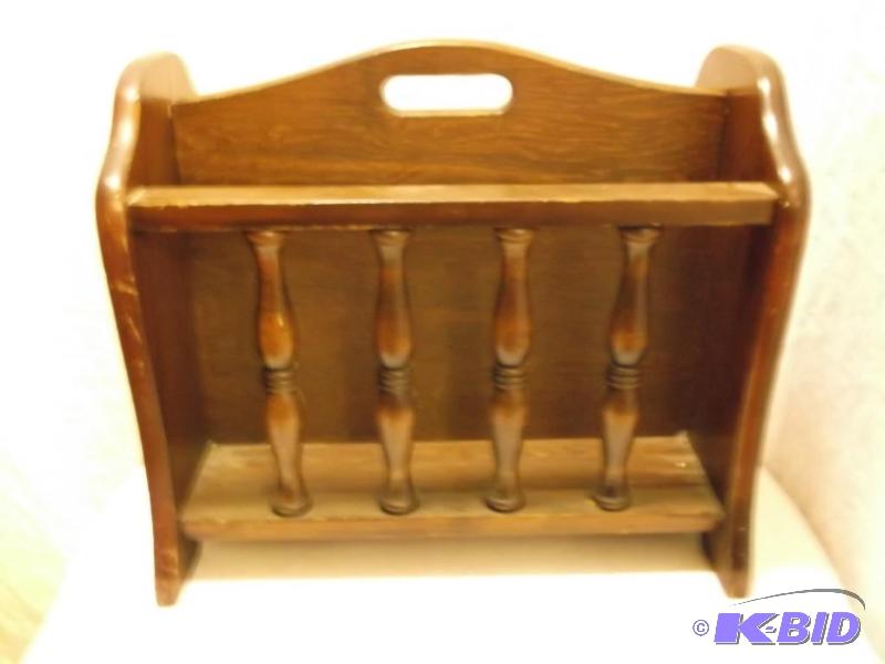 Solid wood newspaper  magazine rack appears ...
