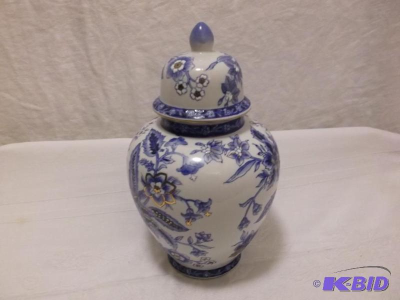 Beautiful porcelain covered vase measuring 9&...