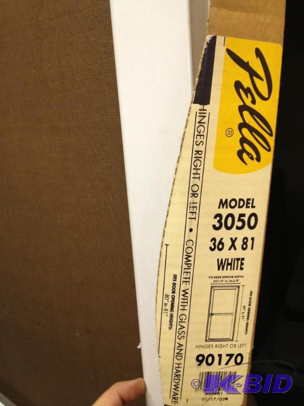 lot 1 image: Pella Storm Door 36 x 81 - New in Box