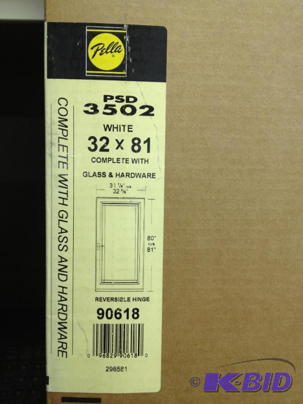 lot 2 image: Pella Storm Door 32 x 81 New in Box