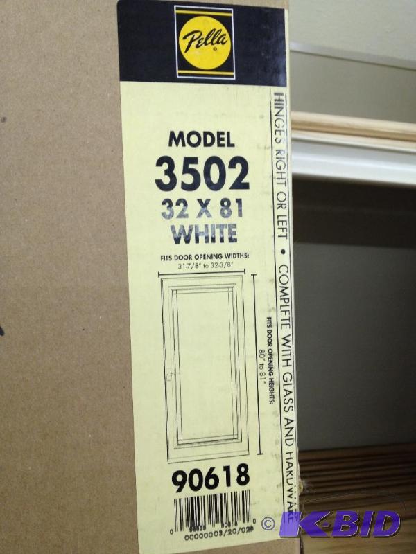 lot 3 image: Pella Storm Door 32 x 81 New in Box