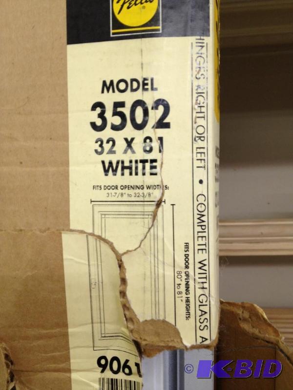 lot 4 image: Pella Storm Door 32 x 81 New in Box